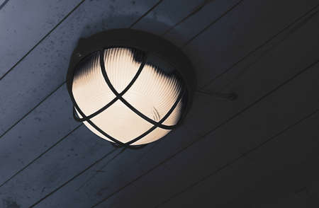 It was so sad and blue lamp lonely in the empty house.Feels sad and fear.の写真素材