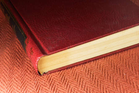 It is a ole and red color Chinese book closed just liked reading done.の写真素材