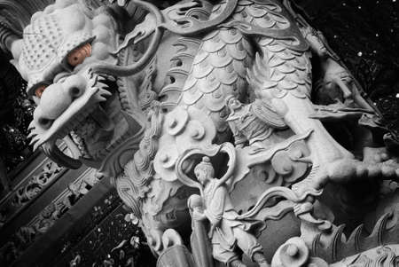 It is a stong carving of Taiwan. Maybe had one long story and fable.の写真素材