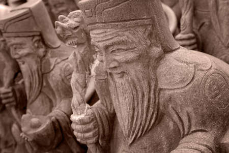 It is a group of chinese stone god of old man.の写真素材