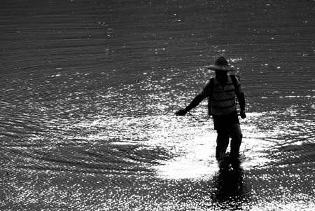 It is a farmer spray insecticide with traditional way on the farm.の写真素材