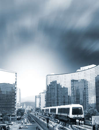 It is a metro car on the way in big city.の写真素材