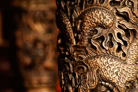 It is golden chinese style carving decoration in the pillar.の写真素材
