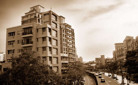 It is a beautiful cityscape contained roads and apartment.の写真素材