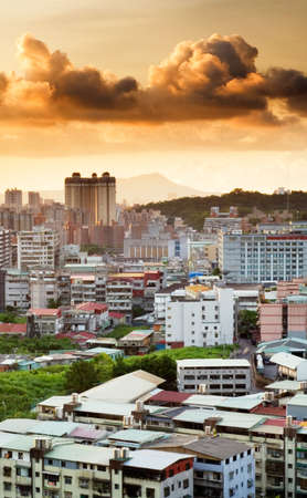 It is a beautiful cityscap of sunset apartment.の写真素材