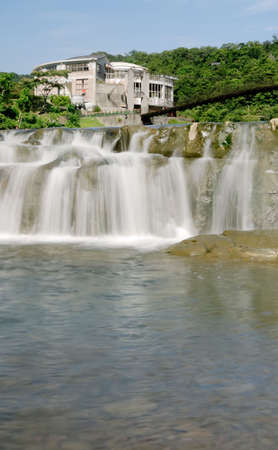 It is a beautiful waterfall from the river.の写真素材