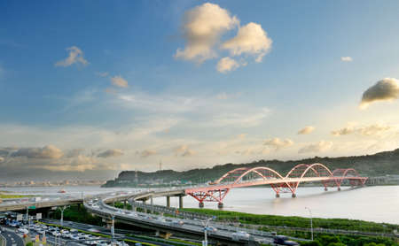 It is a beautiful cityscape of bridge with blue sky.の写真素材