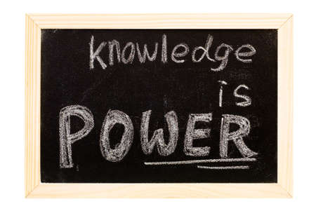 It is a blackboard written "knowledge is power" slogan.の写真素材