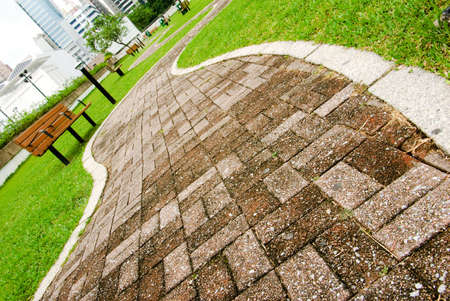 It is a cityscape of green park with curve way acrossed.の写真素材