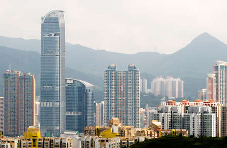 It is cityscape of tall apartments and houses.の写真素材