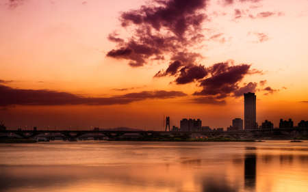 Cityscape of sunset with river and clouds in  Taipei.の写真素材