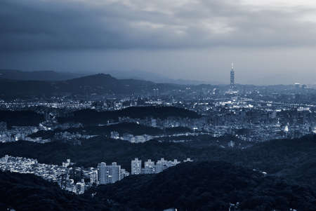 Cityscape of Taipei city night with illuminated buildings and skyline in Taiwan.の写真素材