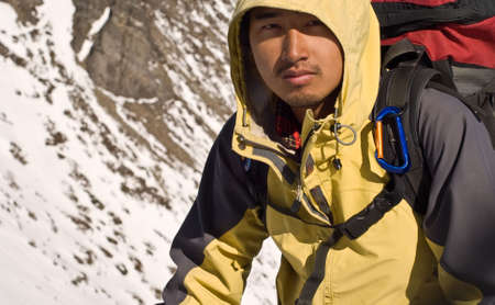 Portrait of Asian mountaineer man with tired face.の写真素材