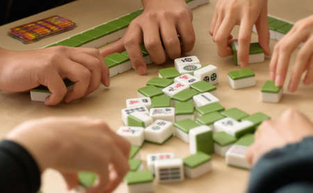 Gambling in Chinese  Mahjong  traditional game with friends.