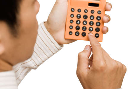 Business man use calculator on white background.の写真素材