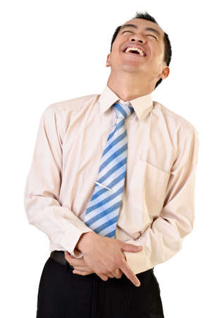 Happy businessman of Asian laughing on white background.の写真素材