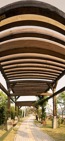 Abstract architecture of corridor of wooden in outdoor.の写真素材