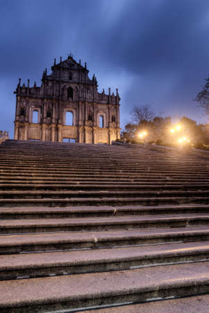 Macao landmark - Ruins of St. Paul's with stairs and lamp in night.の写真素材