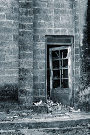 Ruin of old wall and windows and door.の写真素材