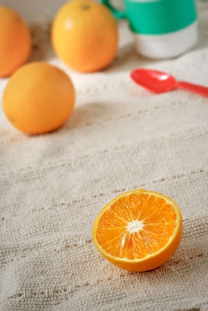 Juicy oranges on desk, scenery of tranquility.の写真素材