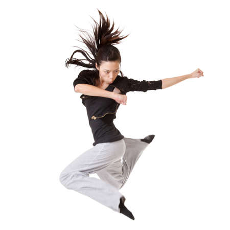Modern cool woman jumping, isolated on white background.