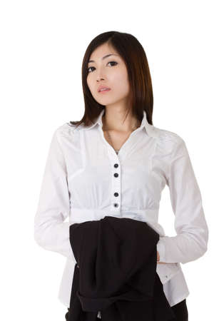 Proud business woman looking at you, closeup portrait over white.の写真素材