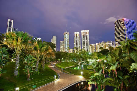 Night scene of modern city with park in Kuala Lumpur, Malaysia, Asia.の写真素材