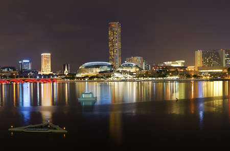 Cityscape of night with skyscrapers and river in Singapore, Asia.の写真素材