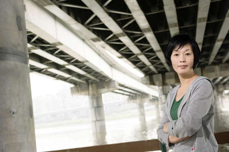 Portrait of sport mature Asian woman in outdoor in daytime.の写真素材