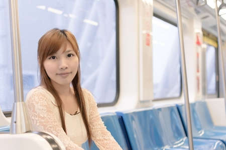 Asian beauty in MRT carriages, Taipei, Taiwan.の写真素材