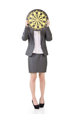 Pretty asian business woman with a target board. Isolated on the white background.の写真素材