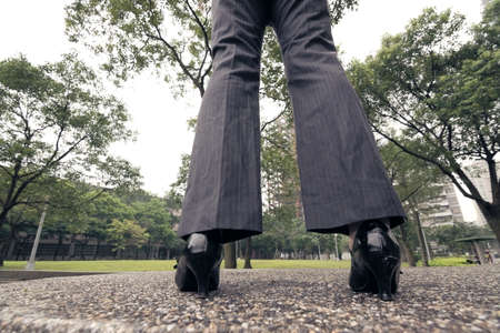 Business woman stand, rear view.の写真素材