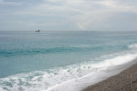 Seascape with boat. Shot at famous attraction, Qixingtan Beach in Hualien, Taiwan, Asia.の写真素材