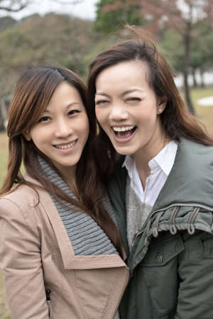 Happy smiling Asian women in the park, taipei, Taiwan.の写真素材