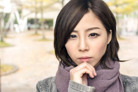 Glamour of Asian beauty, closeup portrait at city.の写真素材