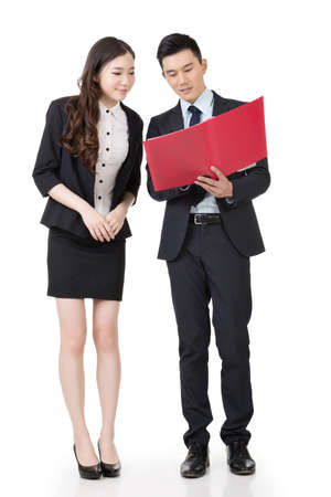 Asian business man and woman discussing, full length portrait isolated on white background.の写真素材