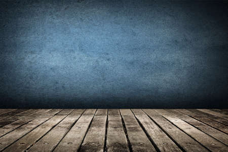Wooden ground with grunge wall background.