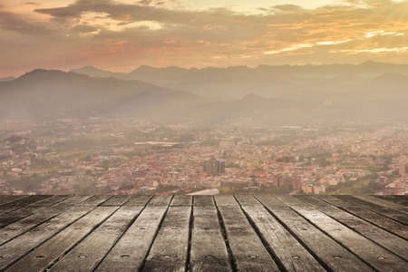 City sunset with wooden ground.の写真素材
