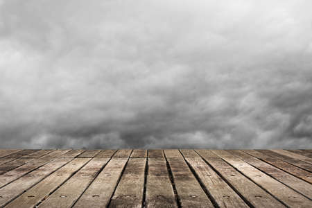 Wooden ground with copyspace on sky.