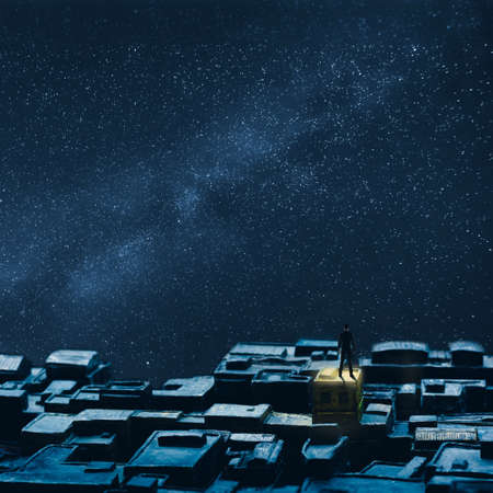 Single businessman standing on the roof under sky of stars, concept of lonely, single, peace etc.の写真素材