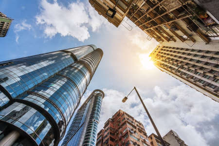 Hong Kong street scenery with high buildings under sky, Asia.の写真素材