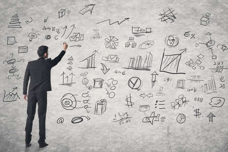 Concept of business plan, photo compilation with Asian businessman and hand drawing background.の写真素材