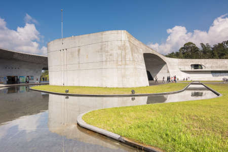 NANTOU, TAIWAN - FEB 20   Xiangshan Visitor Center scenery with many tourists walk there on February 20, 2014 in Nantou, Taiwan, Asia  The building is famous landmark in Sun Moon Lake park in Nantou, Taiwan のeditorial素材