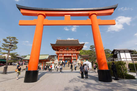 KYOTO, JAPAN - APRIL 27   Fushimi Inari Taisha Shrine with red big torii in Kyoto, Japan on 27th...