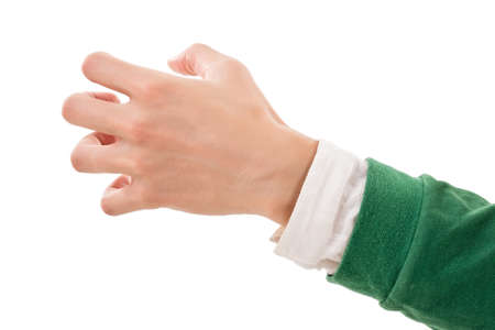 Man's hand holding something, closeup image.