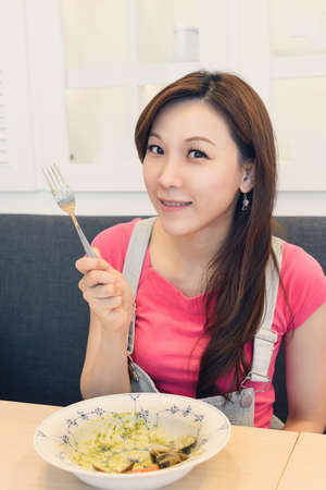 Asian lady ready to eat, closeup portrait.