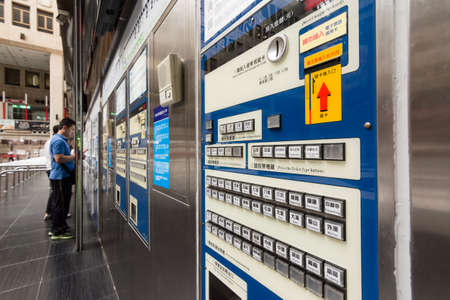 TAIPEI - JULY 4th : Tourists and tickets vending machine at Taipei Station in 4th, 2014 in Taipei,...