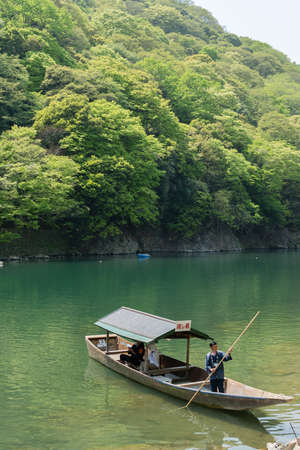 KYOTO, JAPAN - APRIL 26th  : The ferry of  Hozu(Katsuragawa) River  in Arashiyama in Kyoto, Japan on 26th April 2014.のeditorial素材