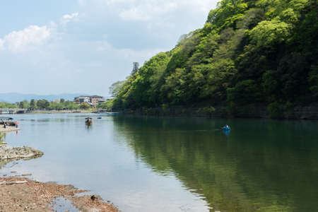 KYOTO, JAPAN - APRIL 26th  : Boats in Hozu(Katsuragawa) River in Arashiyama in Kyoto, Japan on 26th April 2014.のeditorial素材