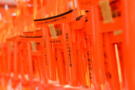 YOSHINO, JAPAN - April 27th : Votive tablets made of the shape of orange torii in Fushimi Inari Taisha Shrine, Kyoto, Japan on April 27th, 2014. のeditorial素材